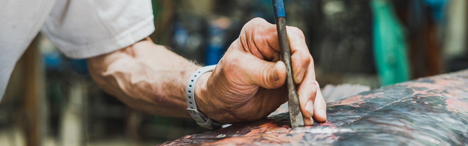 Jim Ardis working on a copper piece.