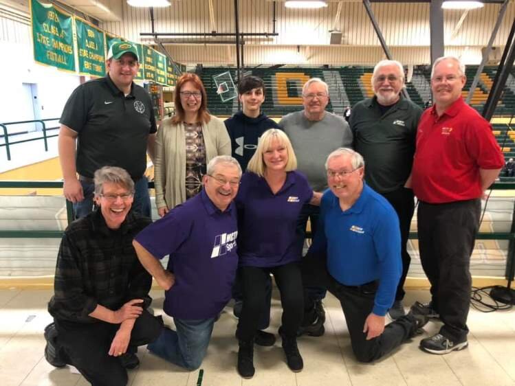 Team of volunteers covering basketball at H.H. Dow High School.