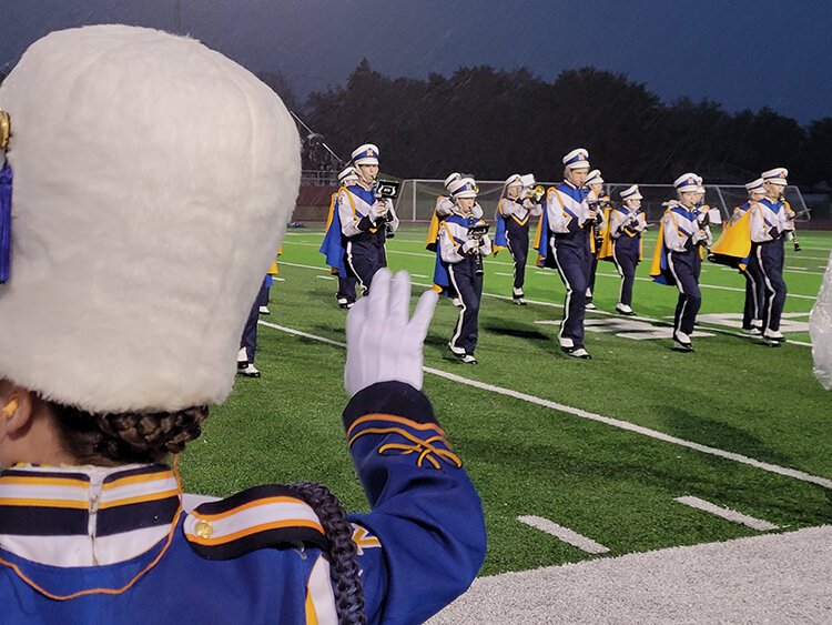 Midland High's band performs in the rain on Oct. 15. (Ron Beacom)
