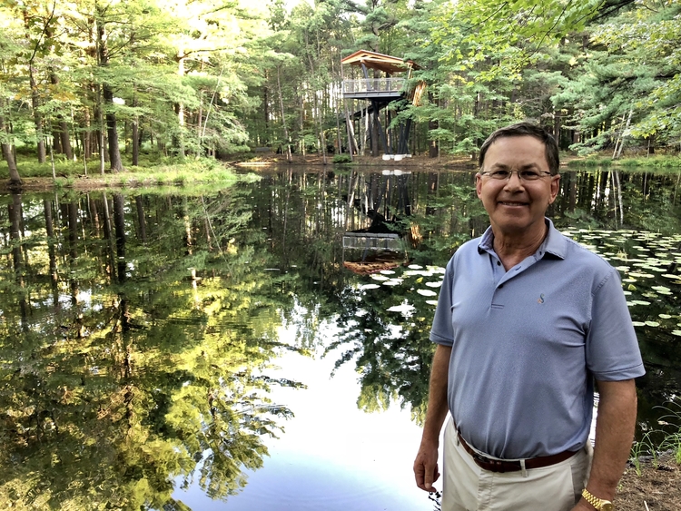 Mike Whiting in front of the new canopy walk at Whiting Forest.