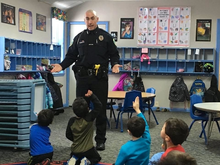 Paul McDonald of the Midland Police Department talking to kids on MPD services.