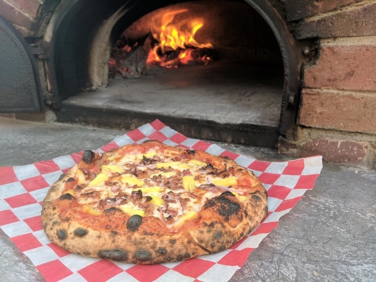 Wood-fired pizza compliments of the Pizza Baker in Sanford. 