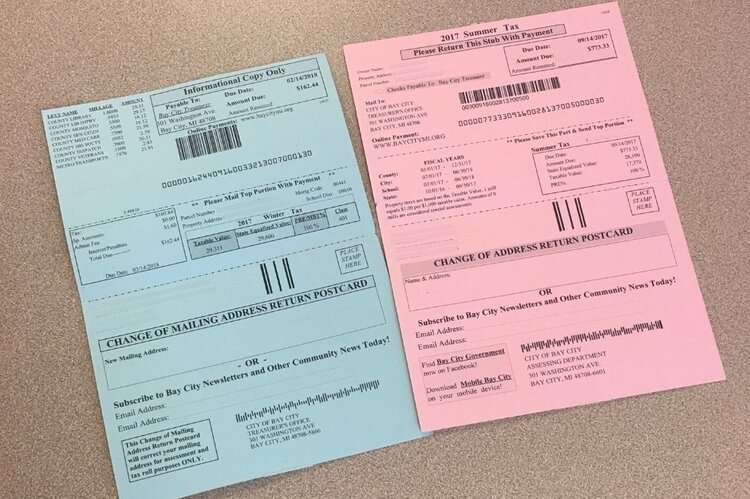 A double postcard contains all information the city is required to send property owners as part of their tax bill.