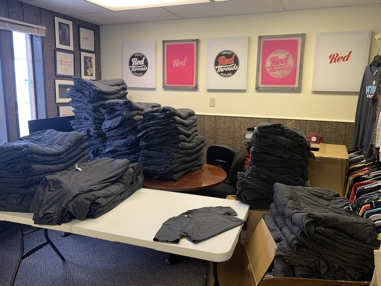 Orders getting ready to be printed. (PC: Red Threads)
