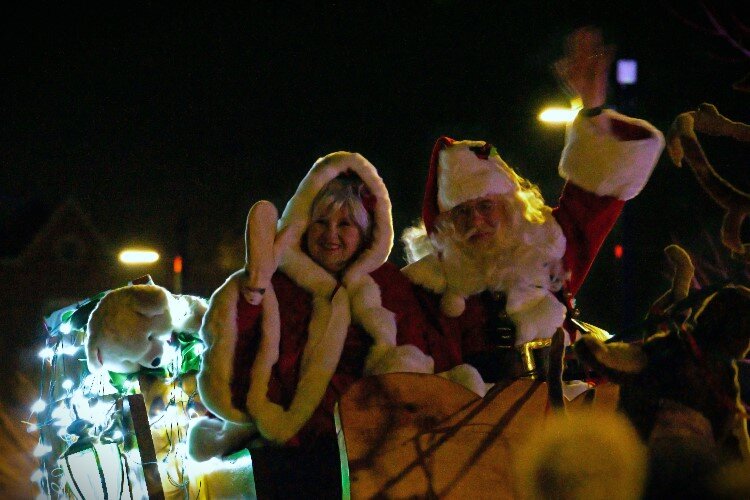 Mrs. Claus and Santa warmly greeted Midland.