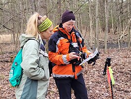 Stacie Scherman (L) and Cindy Vickery take part in a MCSAR field training program.