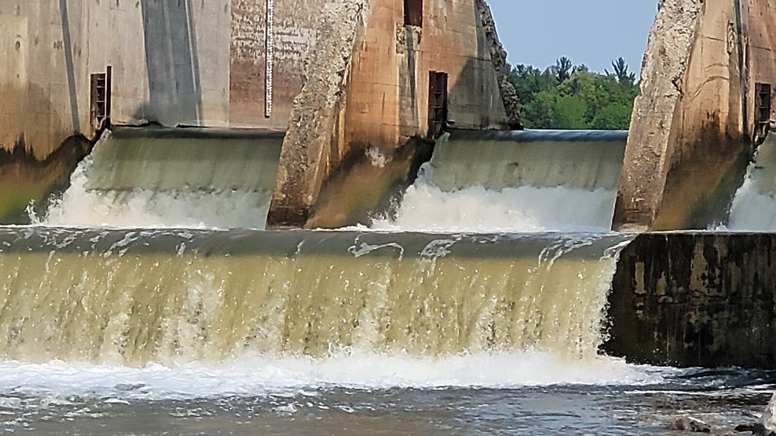 The Tobacco River spillway at the Edenville Dam on Wixom Lake.