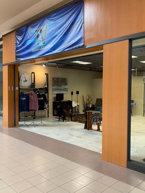 Rickey Fields’s three businesses are housed in the Midland Mall: Total Attention Insurance Brokers, Total Attention Barbershop, and Total Attention Apparel.