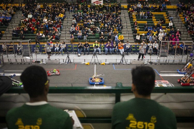 Teams compete in a match during the FIRST in Michigan District Midland Event presented by Dow on March 24 at H. H. Dow High School.