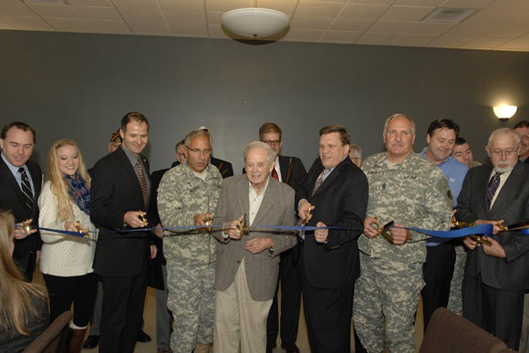 The ribbon is cut on the new Traverse City armory.