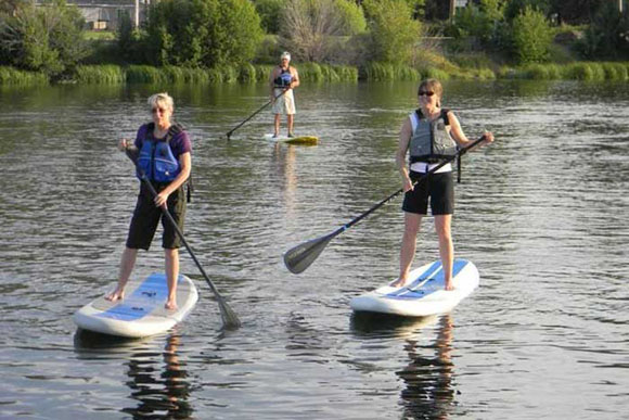 Stand-up paddleboarding is increasingly popular.