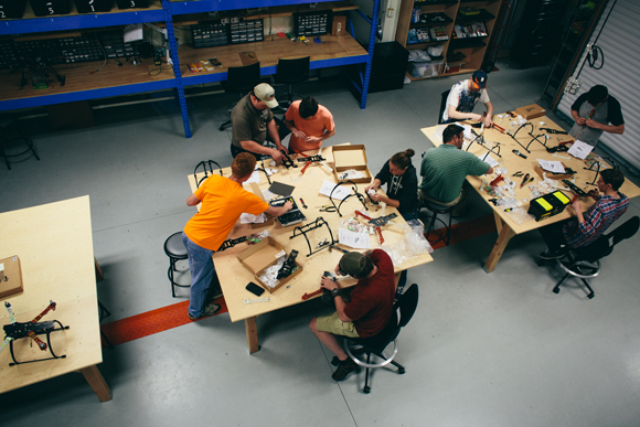 UAS I (Unmanned Ariel Systems I) students put together their hobby level quad rotor frames during class.