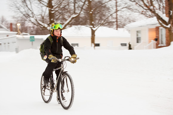 Max Werner bikes his way through the snow. / Beth Price