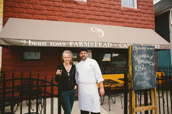 Susan and Paul Carlson in front of the 9 Bean Rows restaurant. 