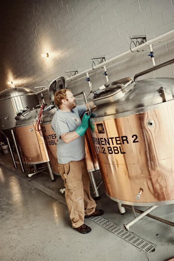 Checking over the equipment at Stormcloud Brewing. 