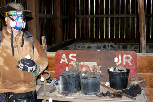 A student working at the farm. / Ted Ligibel