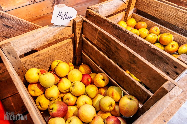 Crates of apples at local farms are a common sight across rural Michigan.