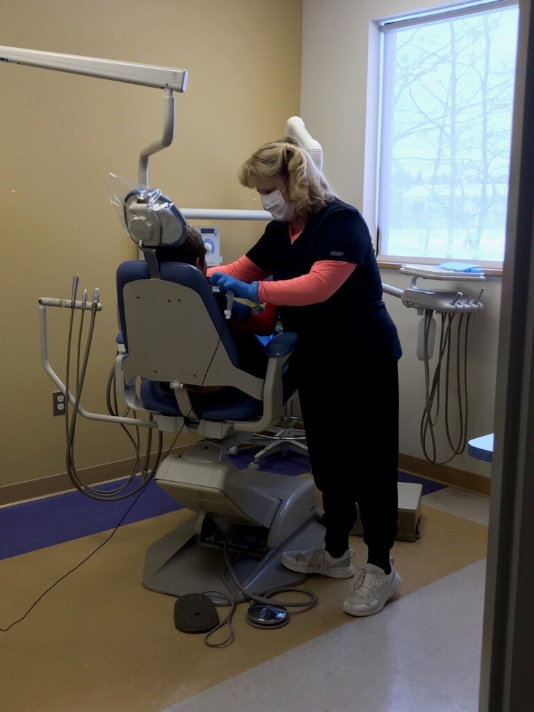 A Beaver Island students get dental attention during the free clinic.