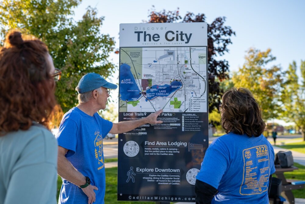 The trail itself was extended from South and Lake streets to the corner of Cass and Lake streets, with a trailhead installed at the terminus.