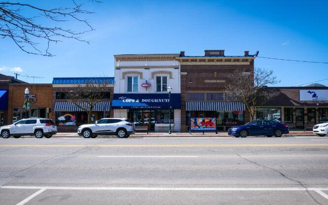 Downtown Clare boasts flagship storefronts such as Cops & Doughnuts, as well as newcomers like Calla Lily Mercantile, which opened less than three years ago.