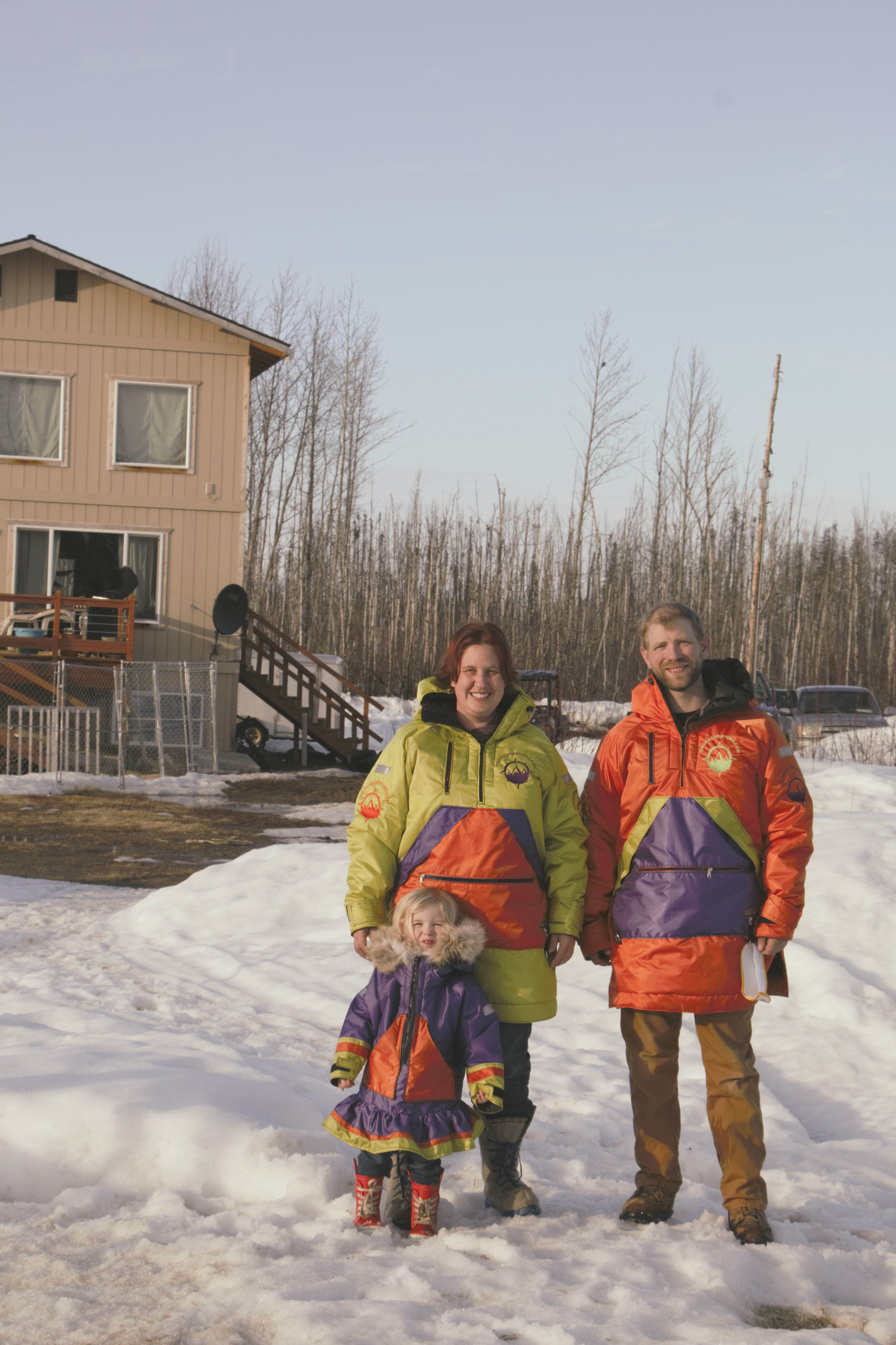 Justin, Jaimee and their daughter in parkas.