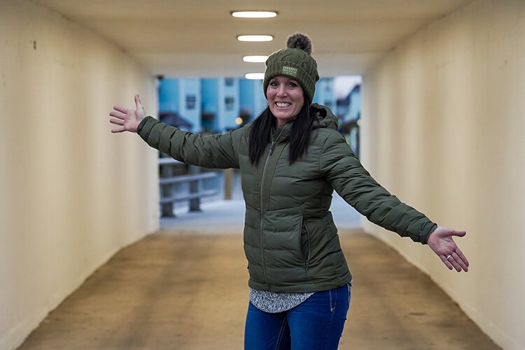 April Cutler showcases the space in the tunnel underneath 7th St. in Port Huron nearby St. Clair County Community College.