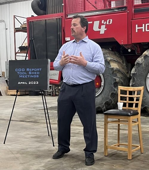 Michigan Sugar Company President and CEO Neil Juhnke addresses grower-owners from the cooperative's East District during a Tool Shed meeting held in April at Maple Grove Acres in Ruth.