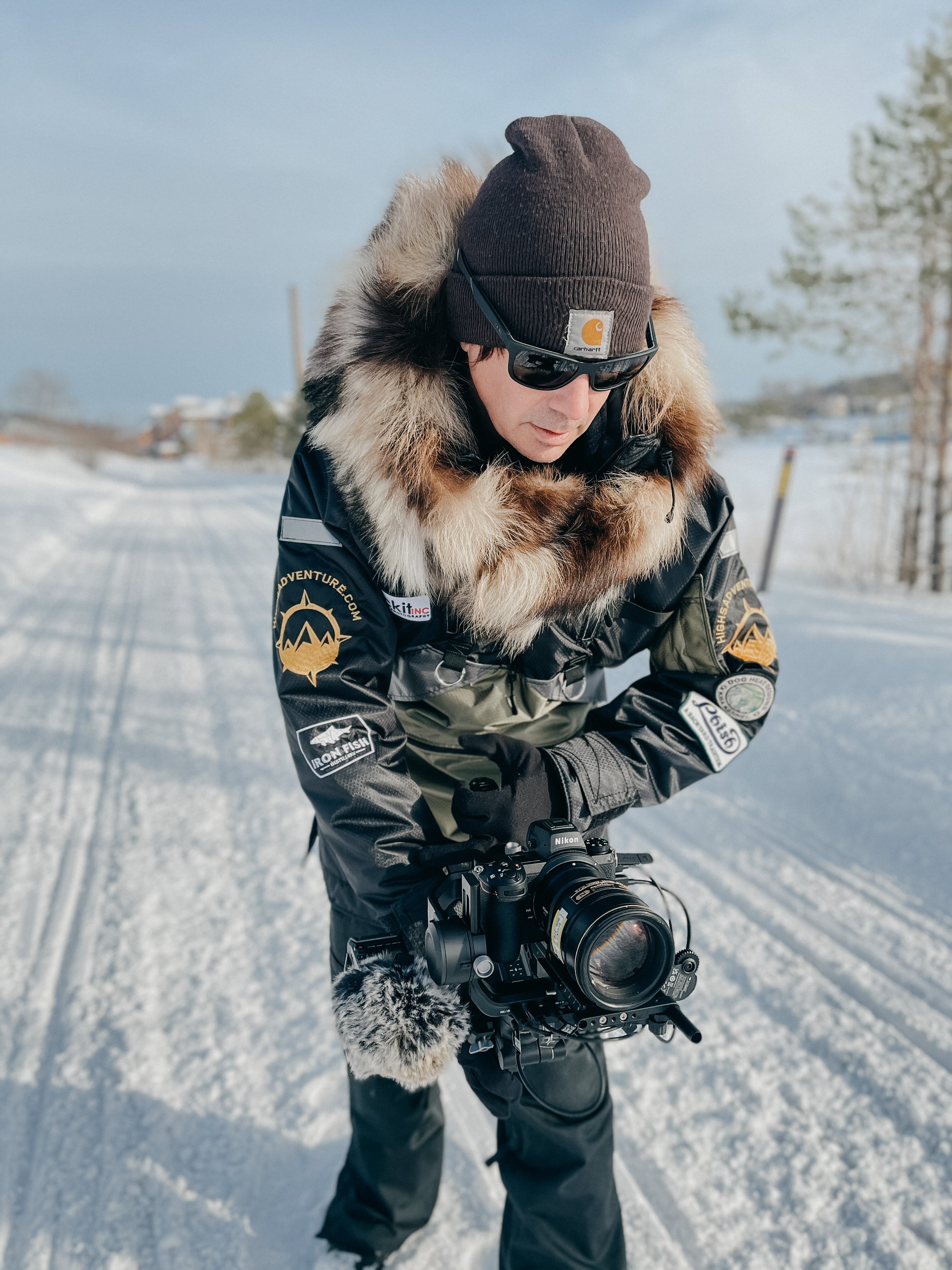 Photographer Adam Johnson wears a High's parka to keep warm on assignments.