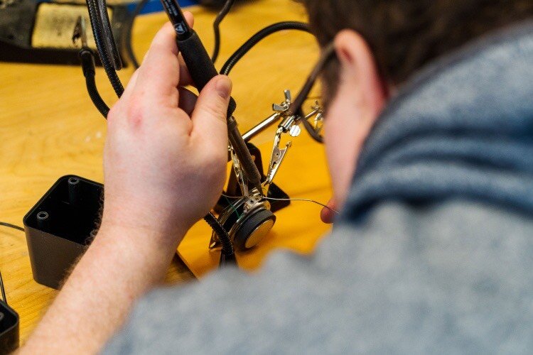 Students work in the Makerspace at Northwestern Michigan College preparing their projects for Northern Michigan Student Pitch Competition.