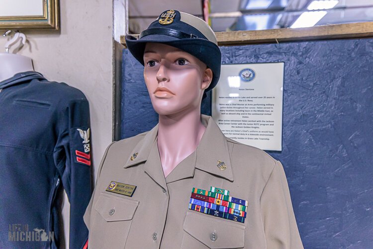 The uniform of Helen Dentone of Grass Lake. She was a chief master of arms in the U.S. Navy.