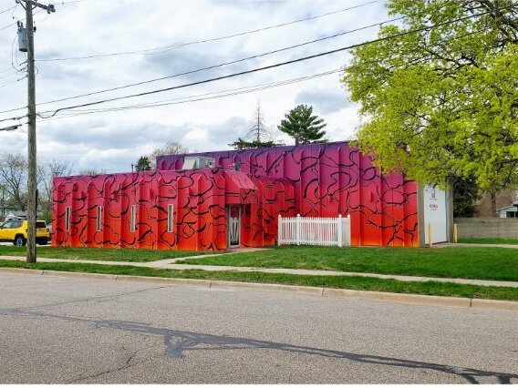 Detroit-based artist Rick Williams painted this mural at the Monroe Community Ambulance building. 