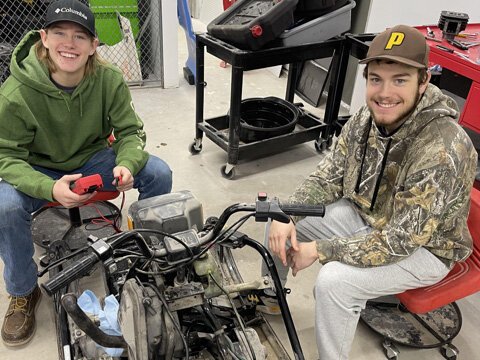 Chris Dankert, left, and Garrett Cameron are both students in the PowerSports Technology program.