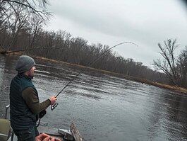 The lack of consistent winter conditions prompted Cadillac tourism official to promote other activities, including river fishing and river rafting.