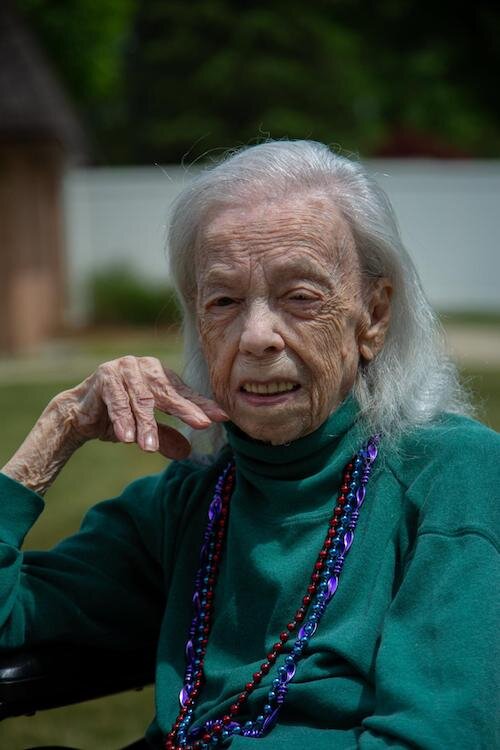 Doris Farmer speed her wheelchair around her assisted living center.