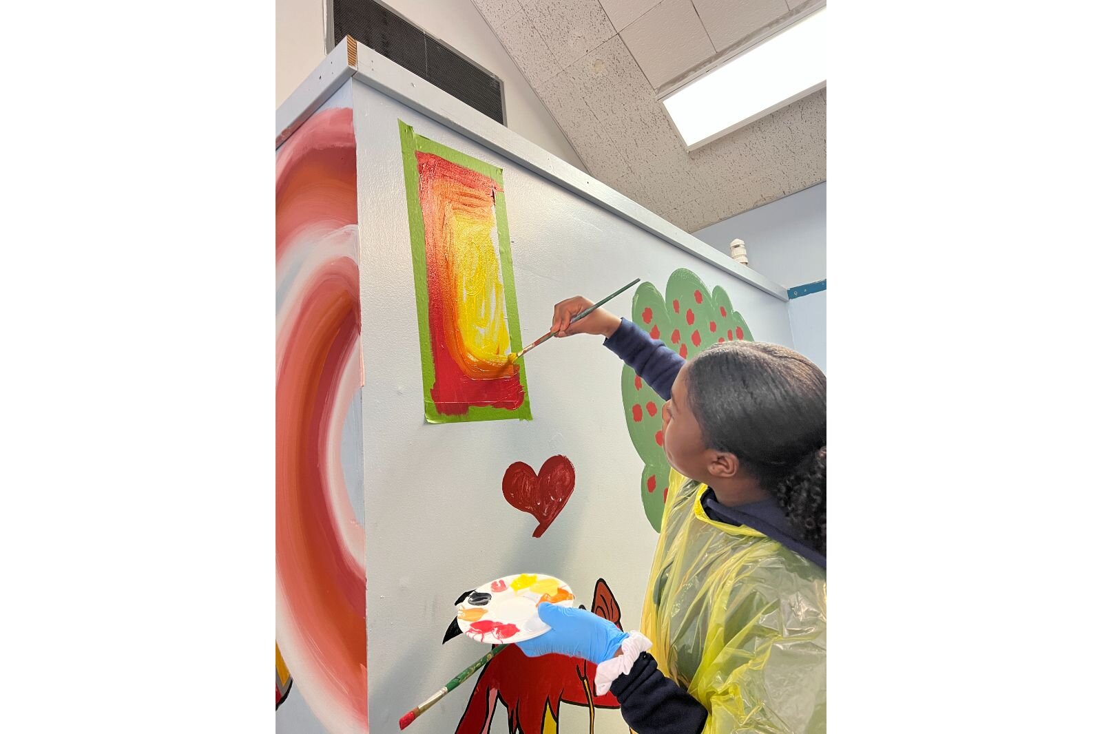 A student learns how to ombre between colors. 