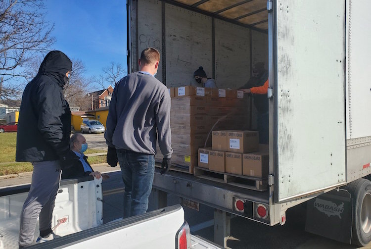 On Wednesday morning volunteers from churches throughout Battle Creek, including the Church of Jesus Christ of Latter-Day Saints, New Level Sports Ministries, unloaded and stacked a truckload of donated food for distribution over the coming weekend.