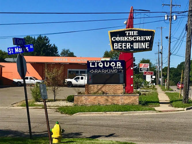 The Milwood Neighborhood is home to many eateries and small business, Shown here is Quekas Restaurant. It is adjacent to the Corkscrew Party Store.