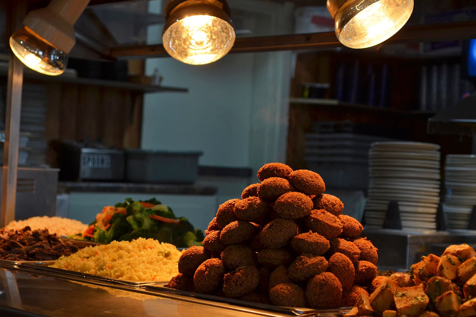 Just before opening at 11 am, the Shawarma King Buffet glows under the heat lamps. Although once owned by the same people 20 plus years ago, Shawarma King on S Westnedge is no longer affiliated with the Shawarma King on Drake Road. 