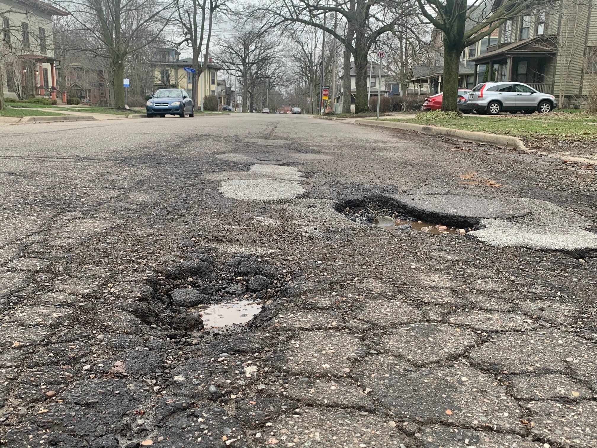 A new neighborhood plan for the Stuart Neighborhood includes fixing up potholes and sidewalks.