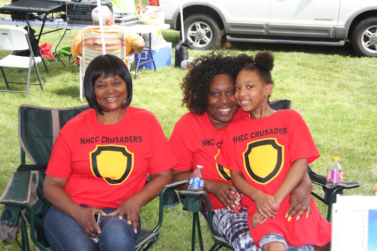 Emjoying the afternoon at a previous Battle Creek Juneteenth celebration.