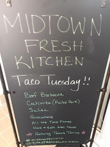 A chef creates meals that change daily at Midtown Fresh.