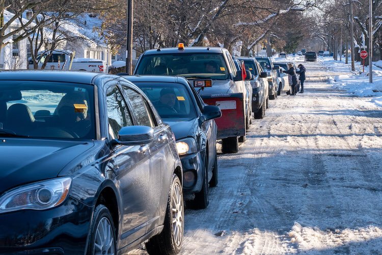 Cars lined up for Fresh Food Distribution.