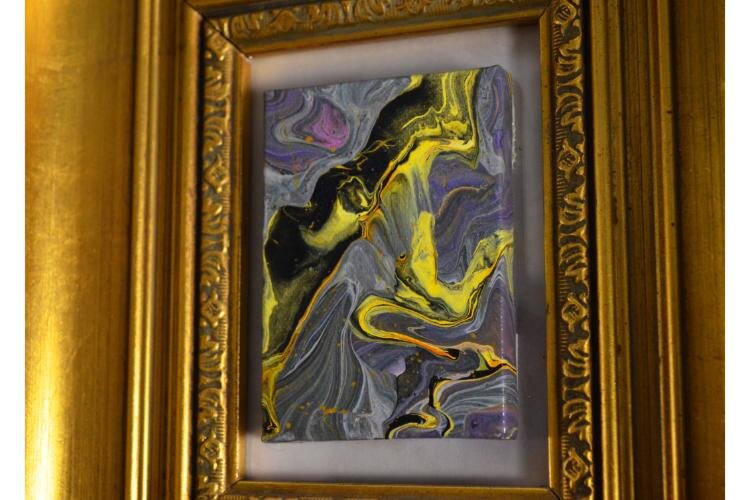 An acrylic pour that is no bigger than a few inches across, a good representation of what Jackson meant when he said physical galleries are important for collectors to understand dimensions.