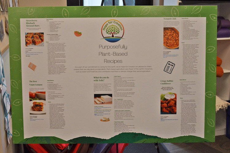 A display board showing some plant-based recipes at People’s Church during a Hope for Creation event in May