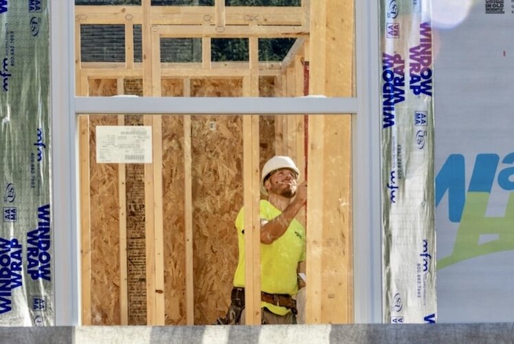 KNHS works with the Home Builders Association of West Michigan to construct new housing in the city’s core neighborhoods. By the end of this year, contractors with the Home Builders will have built 16 homes during the 4-year-old partnership.