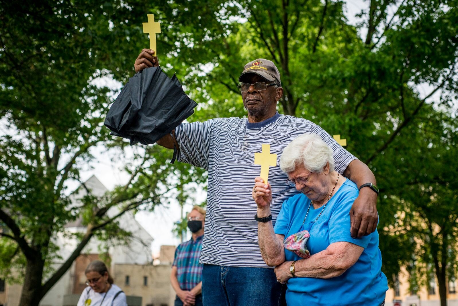 Yellow crosses show solidarity with the 181 black people killed by police since George Floyd has died.