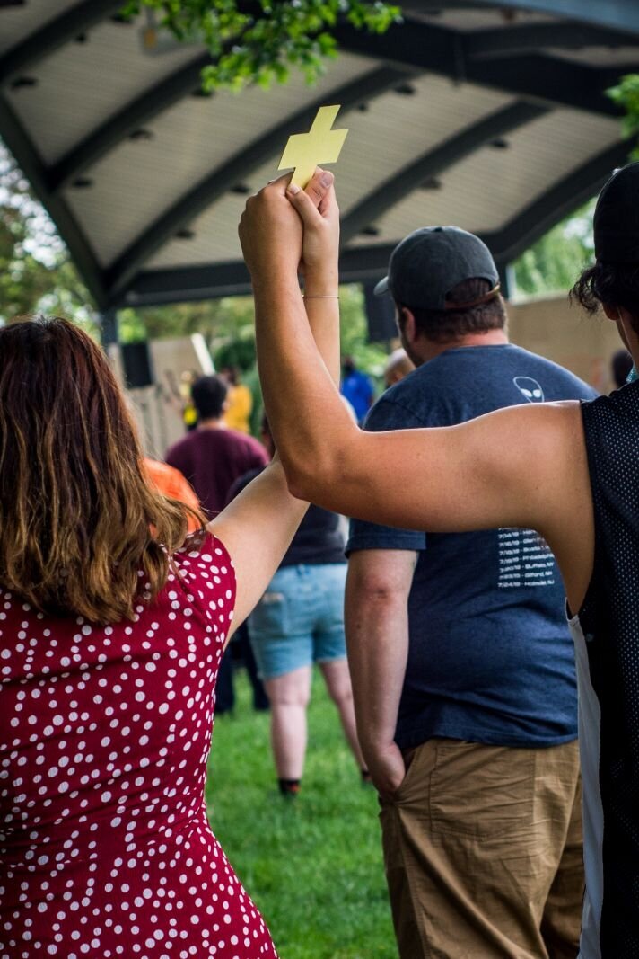 Yellow crosses showed solidarity with those who had been killed since George Floyd's death at a rally in downtown Kalamazoo.