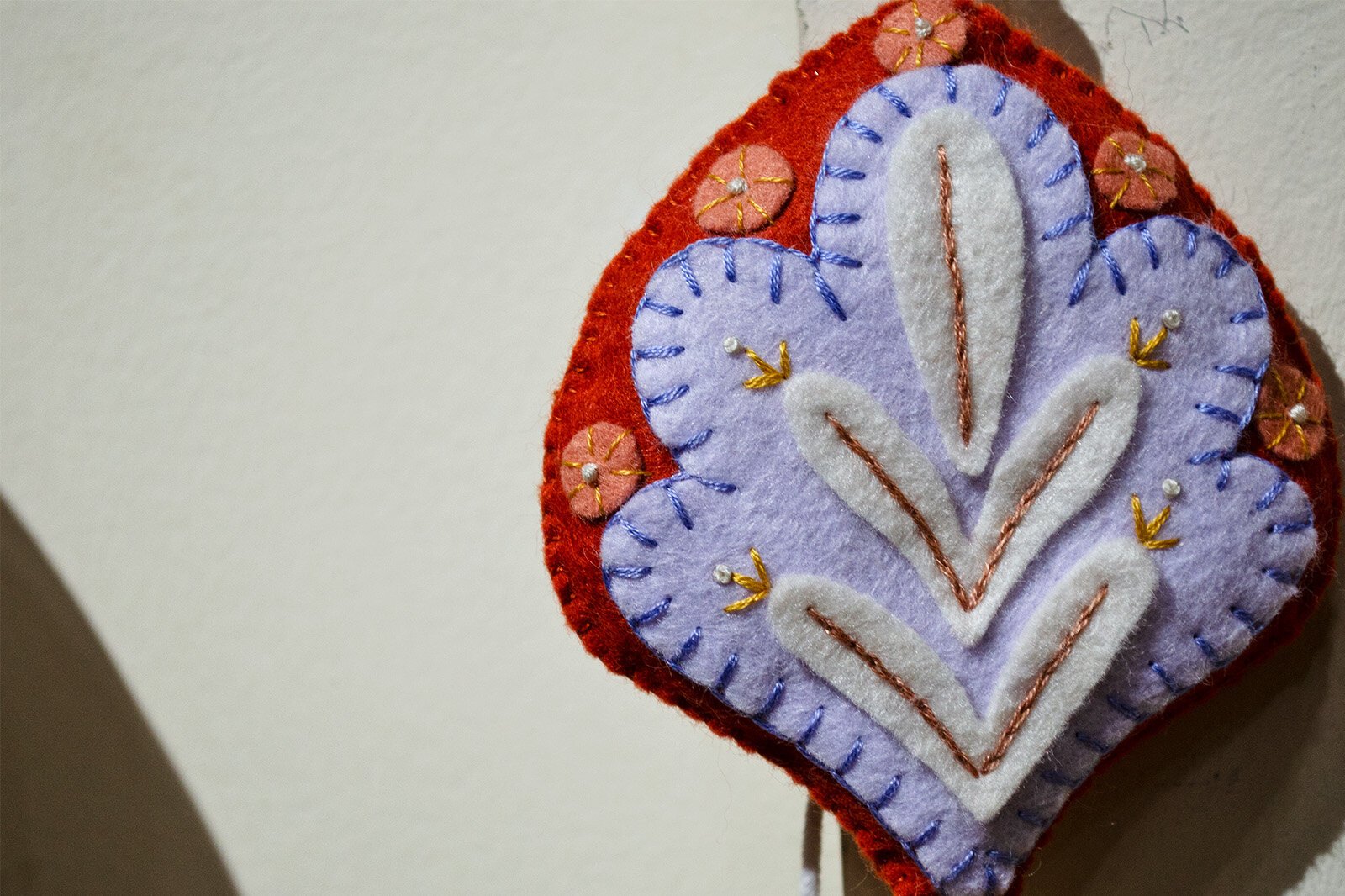 A closeup of embroidery by local maker franandjudy.