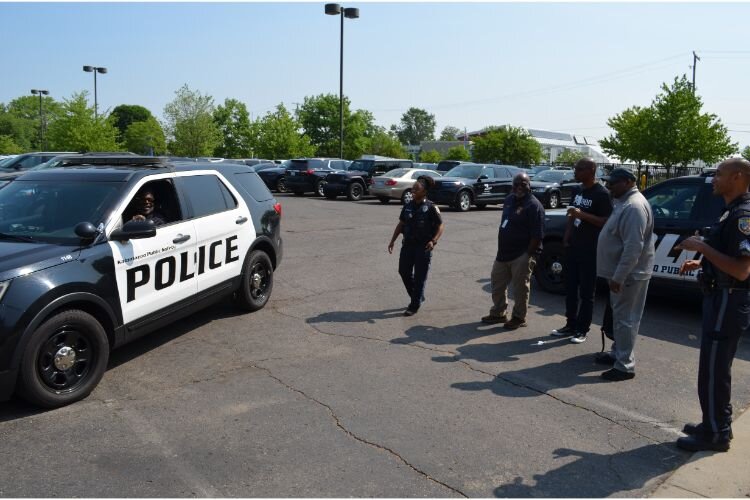 Pastor Greg Jennings was the first to volunteer to get into the drivers seat of the patrol car.