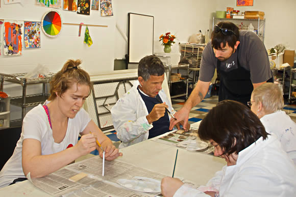 Logan Fleming with group making ornaments